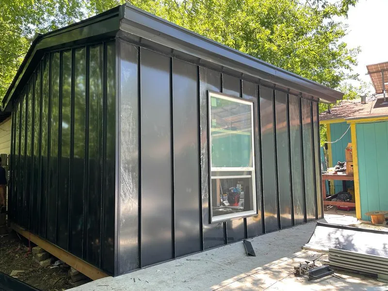 Black standing seam metal wall panels for Metal Roof Installation in Windham